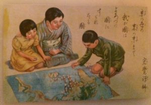 A postcard depicting a mother and her two children looking at a map